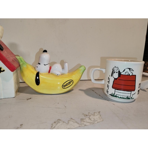 185 - 2 Snoopy Money Boxes Plus 2 Mugs One Mug Chipped