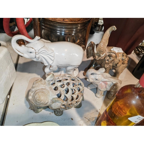 504 - 4 Various Elephant Ornaments