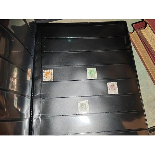 562 - 2 Albums Of Stamps