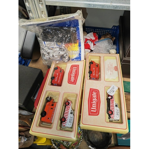 130 - 2 Boxed Lledo Unigate Diecast Truck Sets Plus A Diecast Triumph Dayona Bike With Magazine