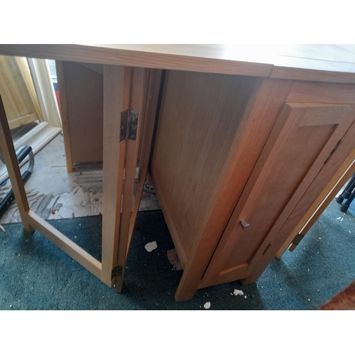 56 - Solid Oak Drop Leaf Table With Cupboard Damage To One Corner