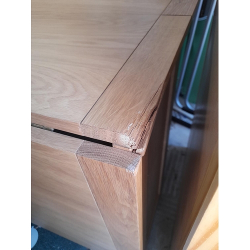 56 - Solid Oak Drop Leaf Table With Cupboard Damage To One Corner