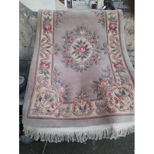 748 - 2 Patterned Rugs