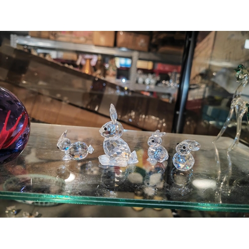 335 - 4 Swarovski Rabbit Figurines
