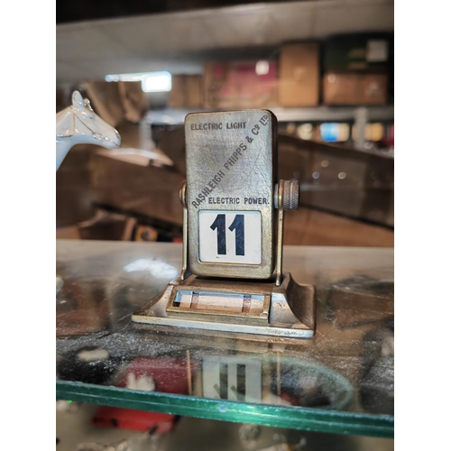 337 - Base Metal Desk Calendar Raleigh Phipps & Co