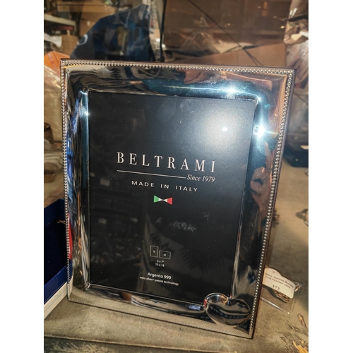 344 - 2 Silver Fronted Heart Patterned Photo Frames