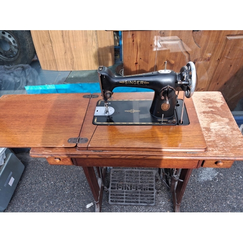 62 - Singer Sewing Machine In Table