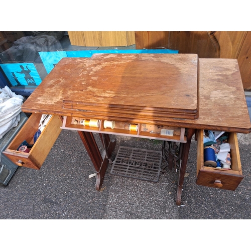 62 - Singer Sewing Machine In Table