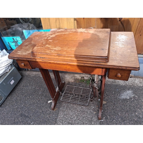 62 - Singer Sewing Machine In Table