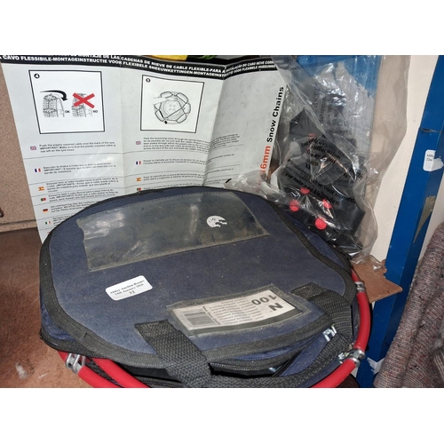 32 - Set Of Snow Chains Plus Snow Shoe Covers