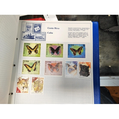 546 - Trident Stamp Album With Some Stamps And Red Ring Binder Of World Stamps Plus One Other Album