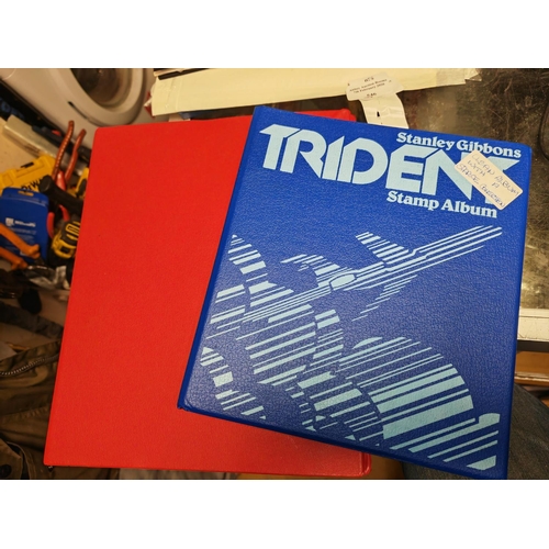 546 - Trident Stamp Album With Some Stamps And Red Ring Binder Of World Stamps Plus One Other Album