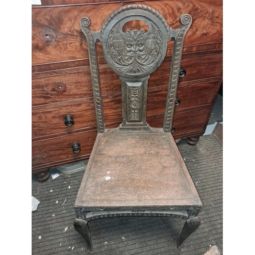 73 - Carved Oak Green Man Chair With Solid Chair