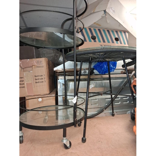 75 - Wheeled Black Trollery And Round Glass Topped Table