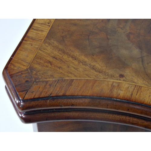 512 - George III crossbanded flame mahogany serpentine games table, with baize lined interior and reeded l... 