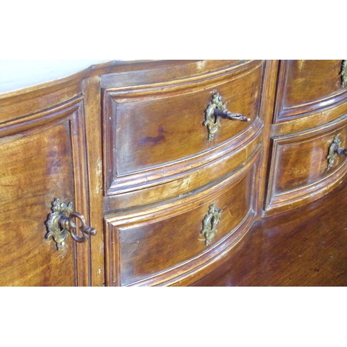 525 - 19th century Italian walnut desk, raised back fitted with four drawers and two cupboard doors, each ... 