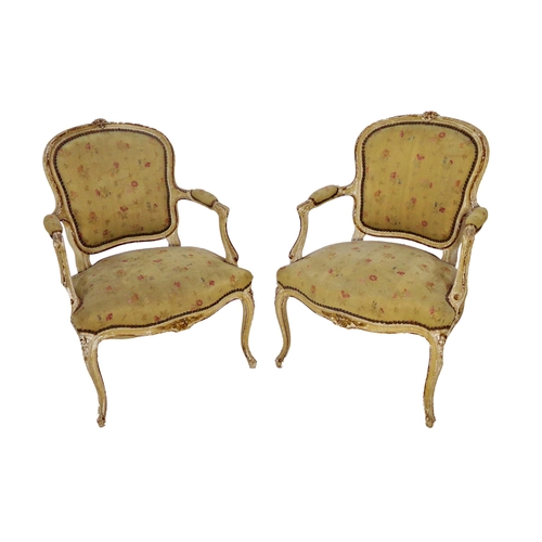 531 - Pair of 19th century French fauteuil salon chairs, painted frames with gilt highlights, studded tape... 