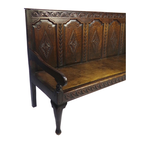 532 - 18th century oak five panel back settle, carved floral decoration, later elm seat, cabriole front le... 