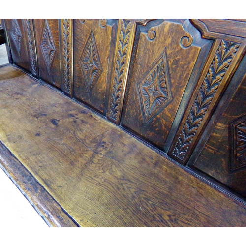 532 - 18th century oak five panel back settle, carved floral decoration, later elm seat, cabriole front le... 