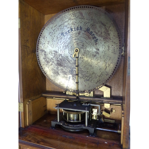 482 - 19th century walnut floorstanding upright polyphone, 2 combs playing 20