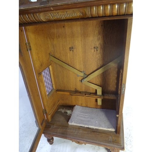 481 - 19th century walnut upright Polyphon case (no mechanism), with penny in slot action, 137cm high