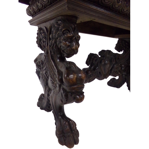 541 - 17th century and later oak twin pillar refectory table, the base carved with mythical winged lions o... 