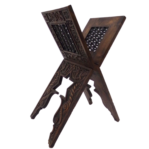 548 - Good quality folding Quran stand, with carved pierced geometric panels and further well carved base ... 