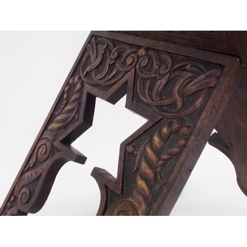 548 - Good quality folding Quran stand, with carved pierced geometric panels and further well carved base ... 