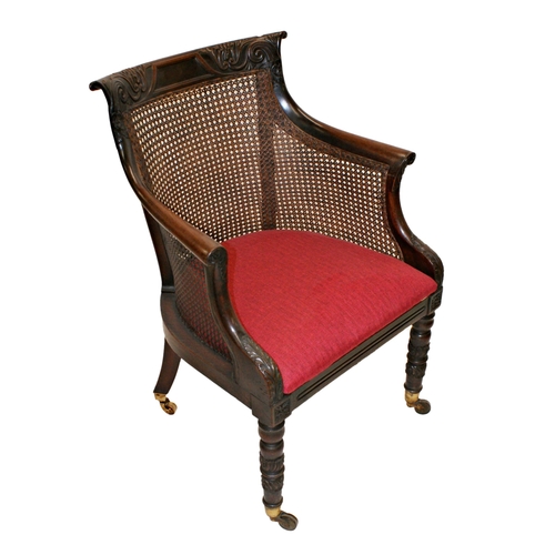 555 - Good quality late Regency Bergere library chair, carved scrolled frame, drop in seat and good turned... 