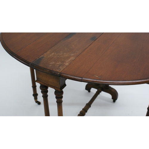 575 - Mid 19th century Howard & Sons mahogany Sutherland table, with oval top and turned supports, 72 x 91... 