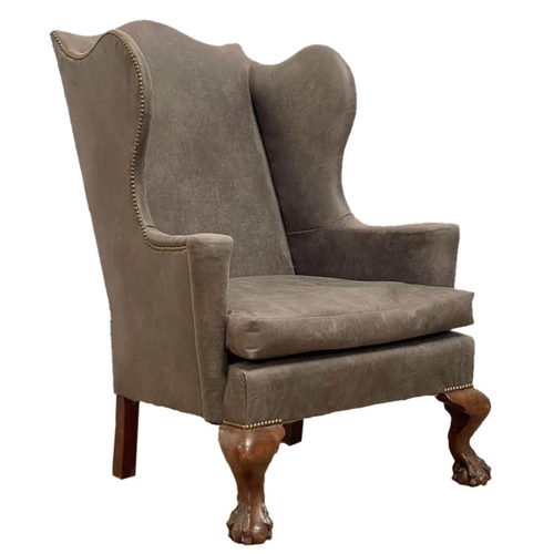 577 - Good substantial Georgian wing back lounge chair, with studded crushed leather upholstery on claw an... 