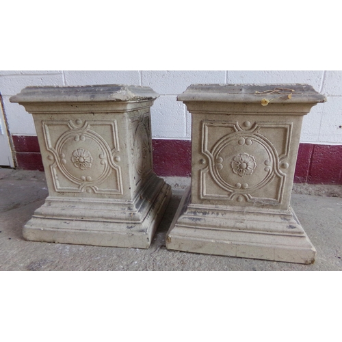 21 - Pair of glazed pottery square plinths, flower head relief and stepped square bases, 52 x 38cm