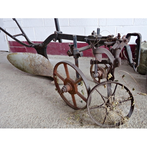 34 - Ruston & Hornsby of Grantham single furrow iron horse plough