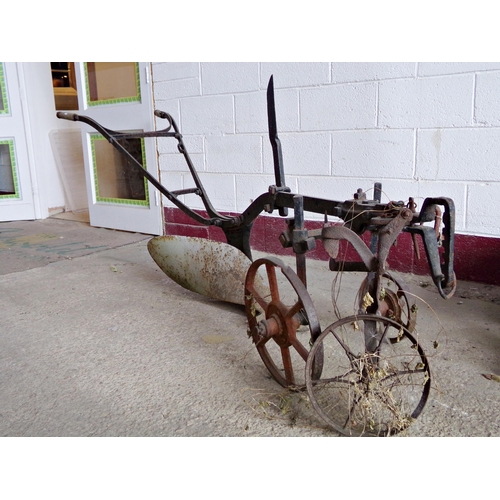 34 - Ruston & Hornsby of Grantham single furrow iron horse plough