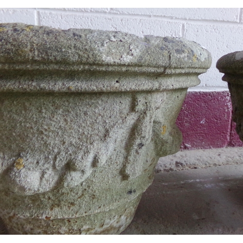 39 - Pair of reconstituted stone planters, with swag relief decoration, 34cm high x 50cm diameter