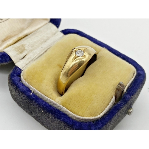 302 - 18ct gold gypsy ring set with a single .10ct diamond, size Q, 3.9 g approx.