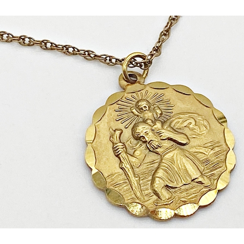 305 - A 9ct gold St Christopher medallion with embossed decoration to both sides and diamond bright cut de... 