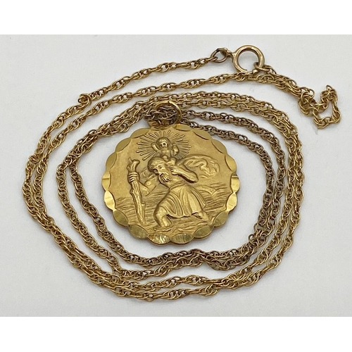 305 - A 9ct gold St Christopher medallion with embossed decoration to both sides and diamond bright cut de... 