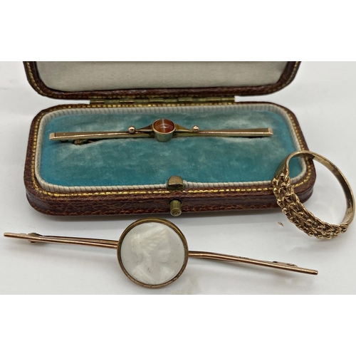 306 - A 9ct gold bar brooch with a central cabochon banded agate in fitted box 5 cm long approx together w... 