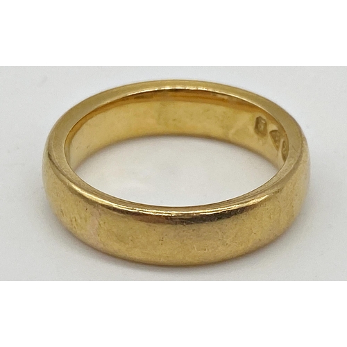 309 - A 22 carat gold wedding band size L. Weight 8.3 g approx