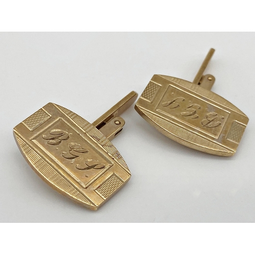 315 - A pair of 9ct gold cufflinks by Swivlink. Weight 14.14 g approx.