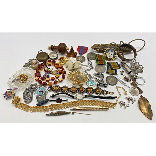 317 - An interesting mixed lot of curios and costume jewellery to include a treen bell pull and a pocket c... 