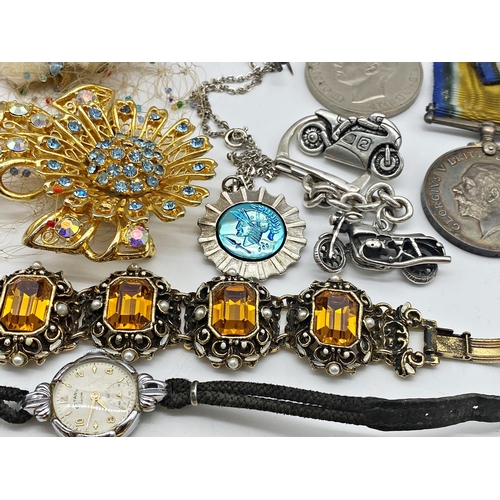 317 - An interesting mixed lot of curios and costume jewellery to include a treen bell pull and a pocket c... 