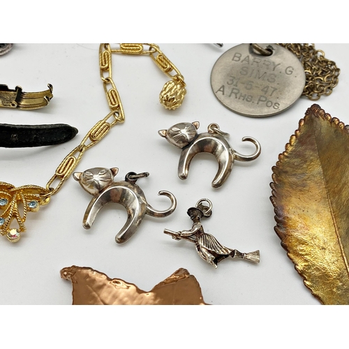 317 - An interesting mixed lot of curios and costume jewellery to include a treen bell pull and a pocket c... 