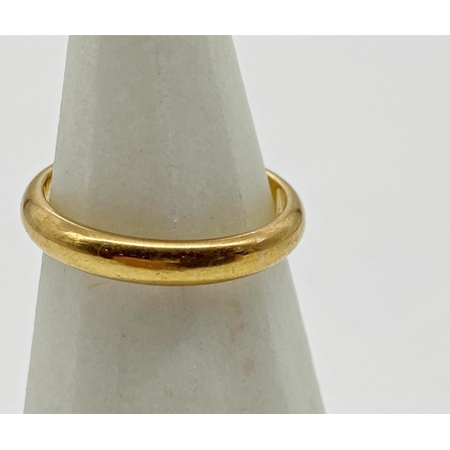 339 - A 22ct gold wedding band, size N 1/2. Weight 4.57 g approx.