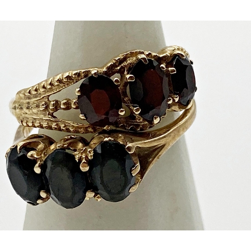 345 - Two 9ct gold dress rings both set with garnet stones. Sizes L 1/2 and M approx. Combined weight 4.67... 