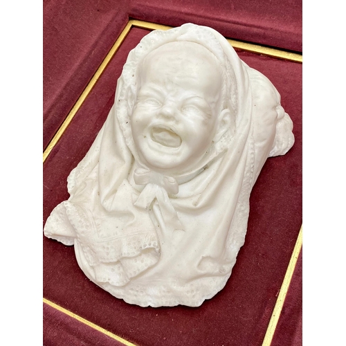 590 - 19th century French marble bust carving of a crying baby, within a velvet cushion gilt wood frame, w... 