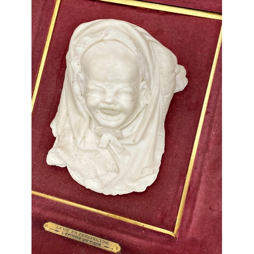 590 - 19th century French marble bust carving of a crying baby, within a velvet cushion gilt wood frame, w... 