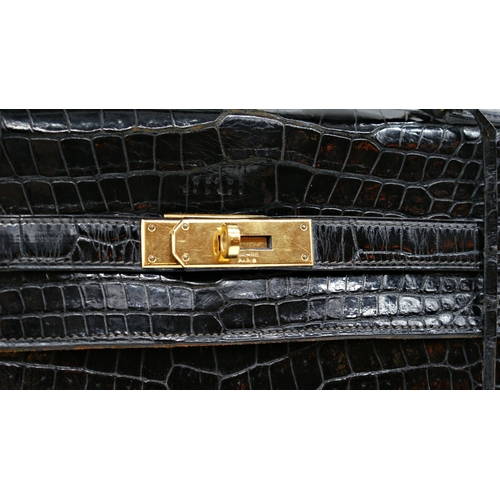 499 - Rare 1959 Hermes of Paris crocodile leather Kelly bag, with padlock, key and suede dust cover, 23 x ... 