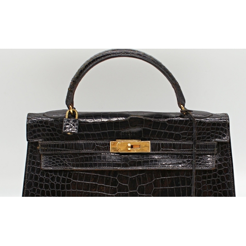 499 - Rare 1959 Hermes of Paris crocodile leather Kelly bag, with padlock, key and suede dust cover, 23 x ... 